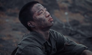 Điều ít biết về vận động viên quốc gia đóng chiến sĩ trẻ tuổi nhất 'Mưa đỏ'