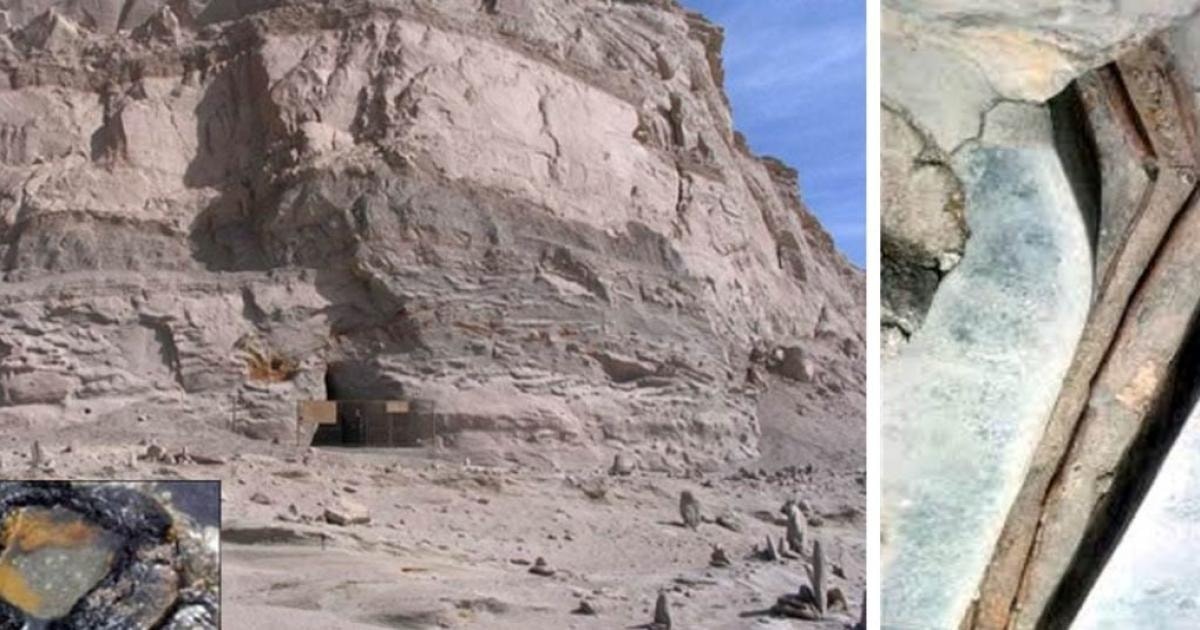 Một lối vào dẫn đến hang động có khối cấu trúc kì lạ và một đoạn cấu trúc vừa giống cây vừa giống ống nước.