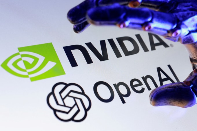 Logo Nvidia và OpenAI trên màn hình máy tính. Ảnh: Reuters