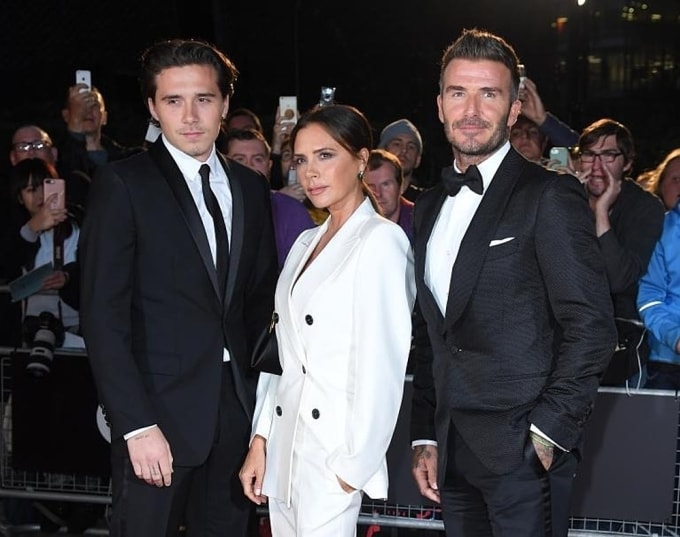 Brooklyn và bố mẹ dự sự kiện GQ Men of the Year Award tại London, Anh, năm 2019. Ảnh: WireImage