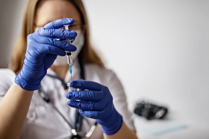Minh họa quá trình nghiên cứu vaccine ung thư. Ảnh: Vecteezy