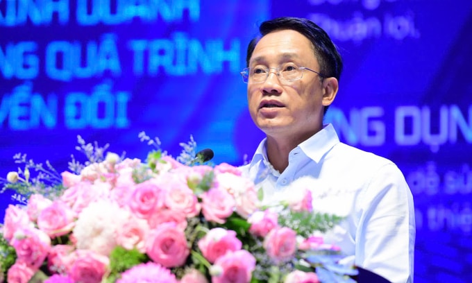 Ông Mai Sơn - Phó cục trưởng Cục Thuế tại hội nghị sáng 8/10 ở TP HCM. Ảnh: Tuổi trẻ