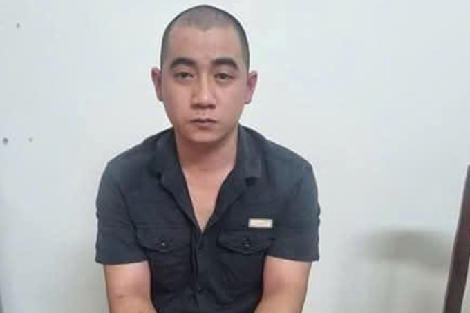 Đặng Văn Sang tại cơ quan công an. Ảnh: Ngọc Oanh