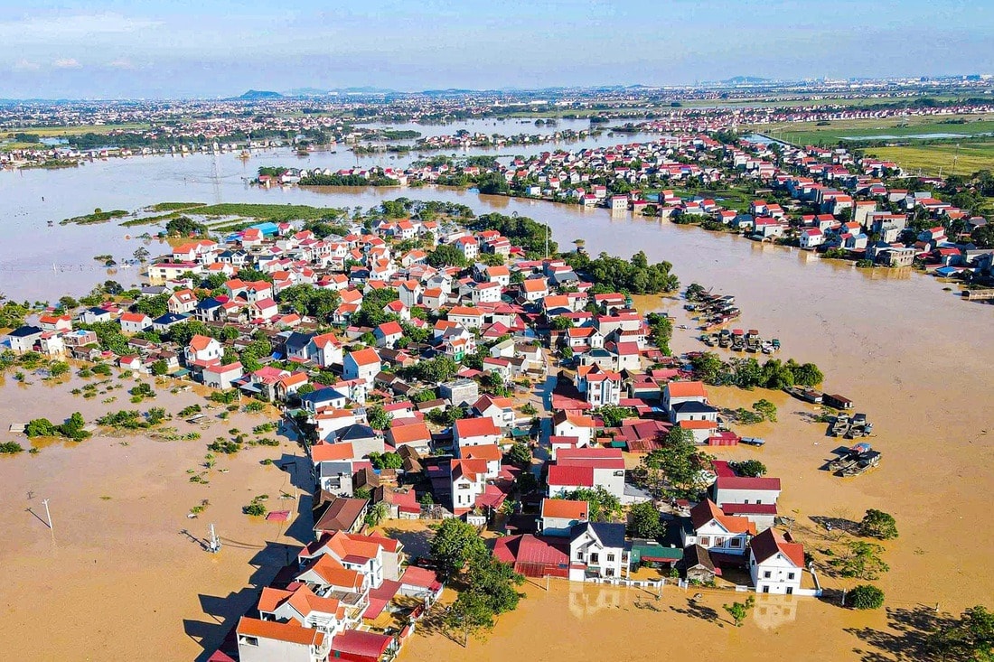 Lũ sông Cầu Bắc Ninh khiến nhiều thôn chìm trong biển nước , cuộc sống đảo lộn - Ảnh 2.