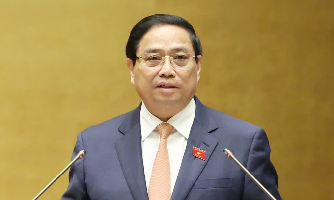 Thủ tướng Phạm Minh Chính báo cáo trước Quốc hội sáng 20/10. Ảnh: Hoàng Phong