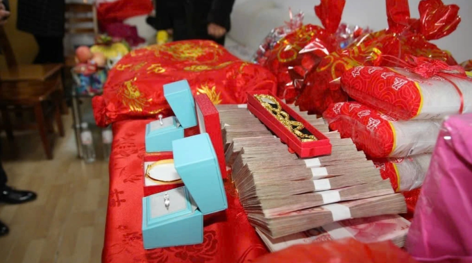 Tiền thách cưới trở thành gánh nặng nhiều đàn ông ở Trung Quốc muốn lấy vợ. Ảnh minh họa: News