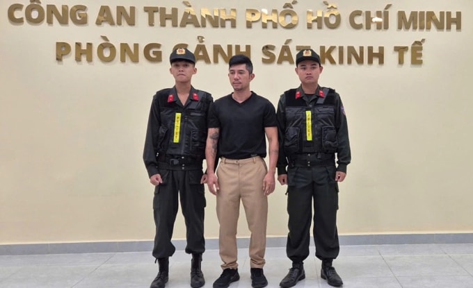 Lương Bằng Quang tại cơ quan điều tra ngày 23/10. Ảnh: Công an TP HCM