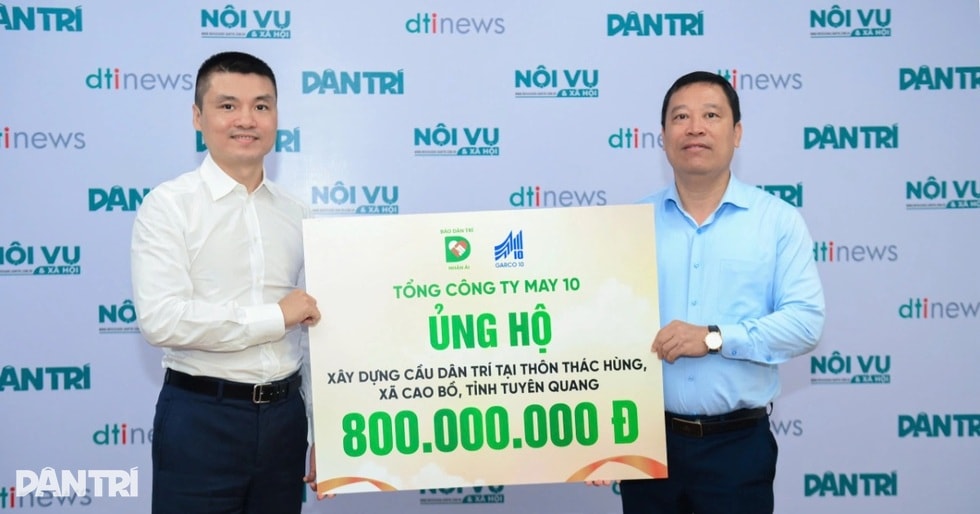 Báo Dân trí tiếp nhận 800 triệu đồng Tổng Công ty May 10 ủng hộ xây cầu - 1