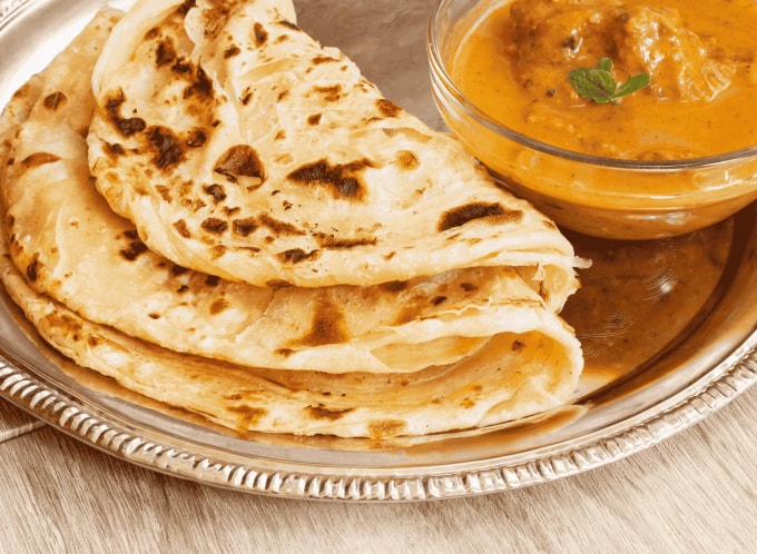 Món bánh mì dẹt roti canai của Malaysia. Ảnh: delishglobe