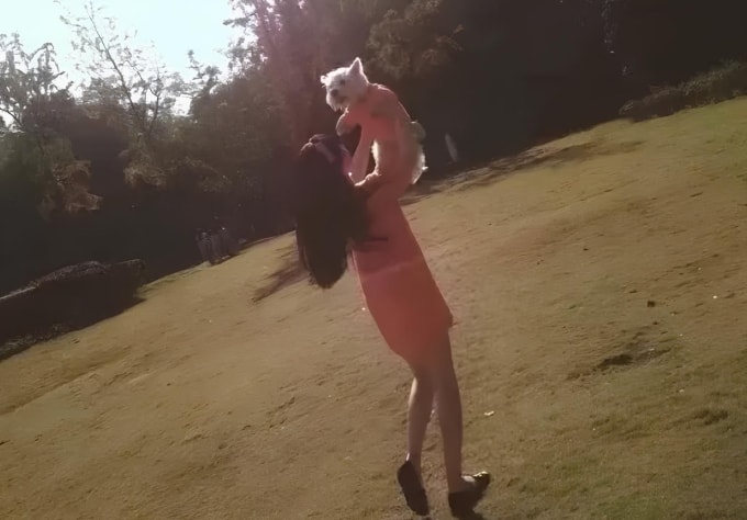 Penny và chú chó Papi khi nó còn sống. Ảnh: Penny