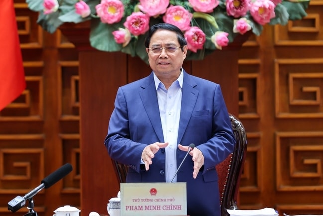 Thủ tướng Phạm Minh Chính phát biểu tại cuộc họp xem xét đồ án quy hoạch trục đại lộ cảnh quan sông Hồng và Khu đô thị thể thao Olympic. Ảnh: VGP