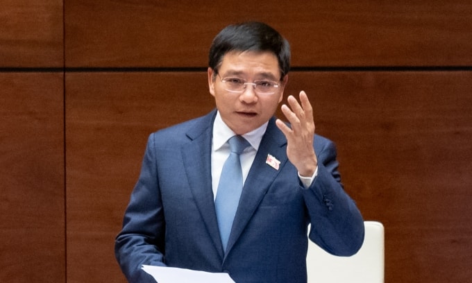 Bộ trưởng Tài chính Nguyễn Văn Thắng giải trình trước Quốc hội chiều 19/11. Ảnh: Đại biểu Nhân dân