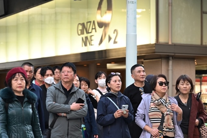 Du khách Trung Quốc tại phố Ginza, Tokyo, ngày 17/11. Ảnh: AFP