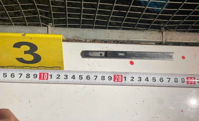 Con dao tang vật vụ án. Ảnh: Nam An