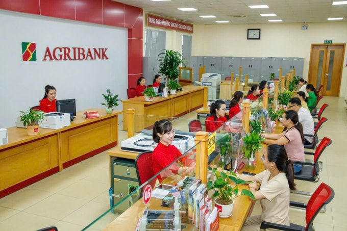 Ngân hàng giảm lãi suất hỗ trợ khách hàng bị ảnh hưởng bởi thiên tai. Ảnh: Agribank