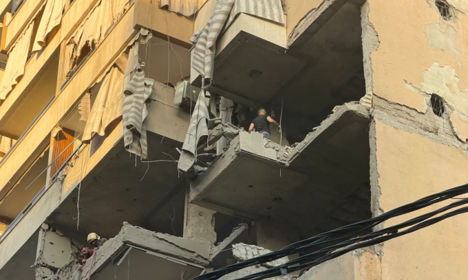 Tòa nhà bị hư hại ở ngoại ô phía nam Beirut sau đòn tập kích của Israel hôm 23/11. Ảnh: AFP