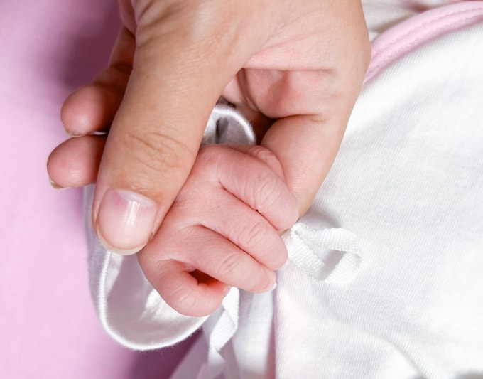 Gia đình chị Mai hạnh phúc đón con đầu lòng. Ảnh: Nhân vật cung cấp