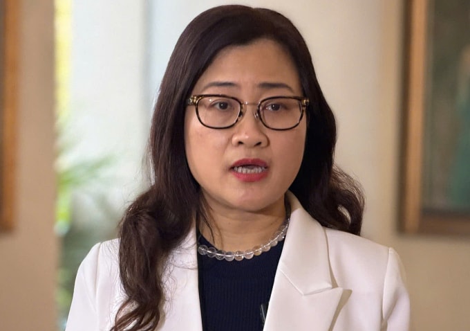 Bà Trần Thị Trang, Vụ trưởng Vụ Bảo hiểm Y tế, chia sẻ tại hội thảo. Ảnh: Lê Nga