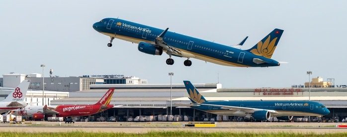 Hàng không Việt Nam phục hồi mạnh mẽ với tăng trưởng 2 con số 2025 - Ảnh 1. Hàng không Việt Nam phục hồi mạnh mẽ với tăng trưởng 2 con số 2025 - Ảnh 1.