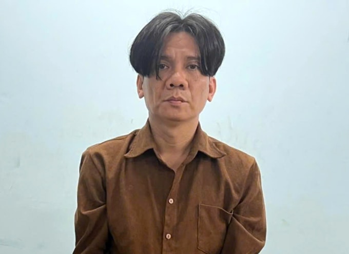 Nguyễn Quốc Huy tại cơ quan điều tra. Ảnh: Công an TP HCM