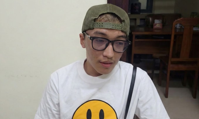 Nghi phạm Lộc khi bị cảnh sát bắt giữ. Ảnh: Lê Tiến