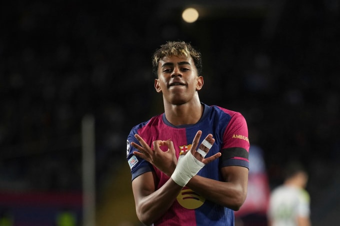 Lamine Yamal ăn mừng sau khi ghi bàn trong trận Barca gặp Benfica ở vòng 1/8 Champions League, trên sân Olympic ở Barcelona, Tây Ban Nha ngày 11/3/2025. Ảnh: AP