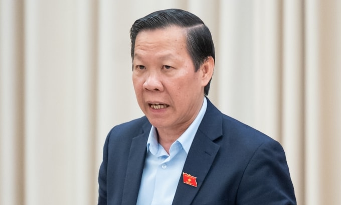 Chủ nhiệm Ủy ban Kinh tế Tài chính Phan Văn Mãi trình bày thẩm tra dự thảo. Ảnh: Media Quốc hội