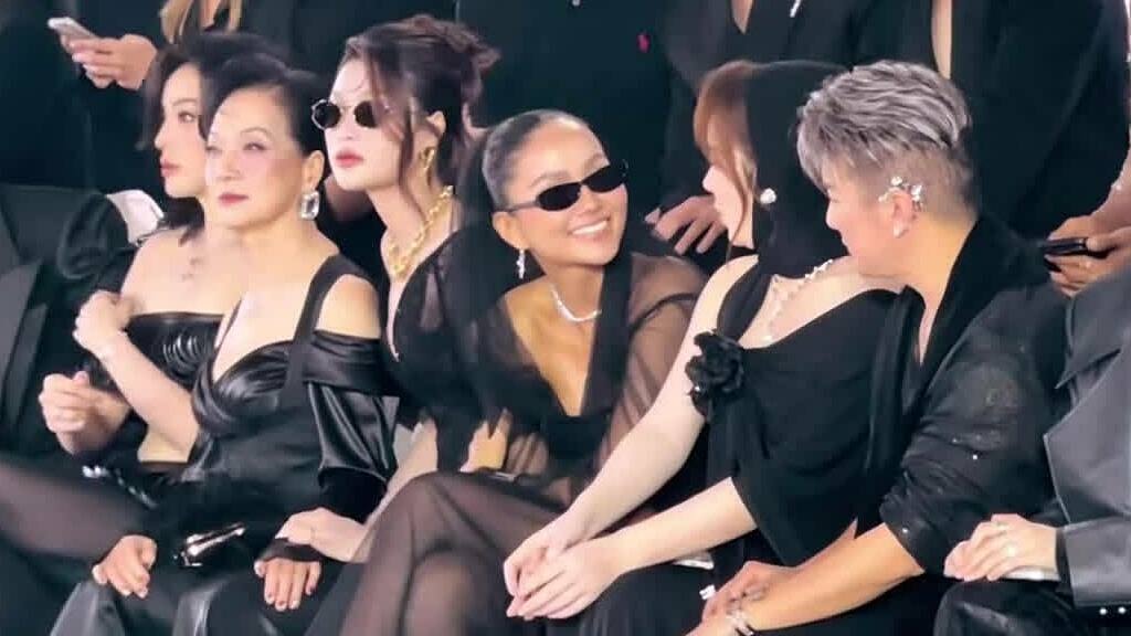 H'Hen Niê xem show thời trang cùng Lý Nhã Kỳ, Đàm Vĩnh Hưng