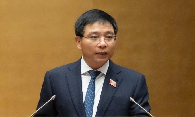 Bộ trưởng Tài chính Nguyễn Văn Thắng báo cáo giải trình tại phiên họp sáng 11/12. Ảnh: Media Quốc hội