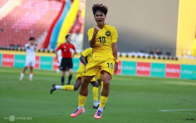 Haykal Danish ăn mừng bàn gỡ hòa cho Malaysia trong trận thắng Lào. Ảnh: Đức Đồng