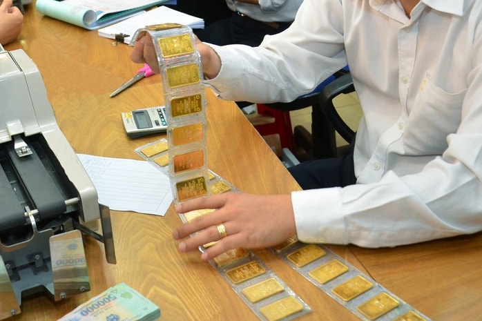 Giá vàng hôm nay 11-12: Tăng tốc khi Mỹ giảm lãi suất - Ảnh 1.