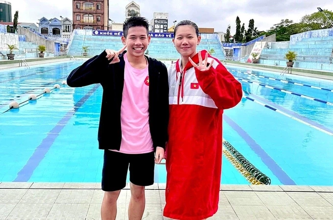 Quang Thuấn và Ánh Viên trong ngày thi đấu đầu tiên ở giải vô địch quốc gia bể 25m tại Huế đầu tháng 3/2022.