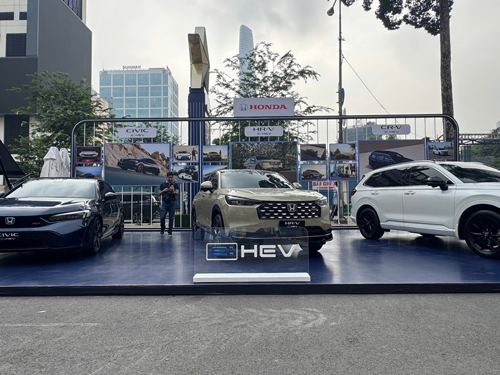 Giá xe hybrid khó giảm ngay - Ảnh 1.