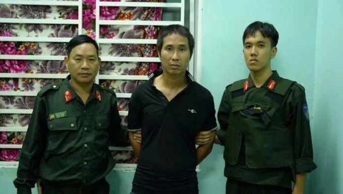 Lê Sỹ Tùng (giữa) bị xác định đủ năng lực trách nhiệm hình sự.  Ảnh:Thái Hà