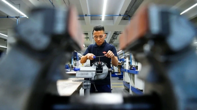 Học viên một trường nghề ở Đức. Ảnh: Wolfgang Rattay/Reuters