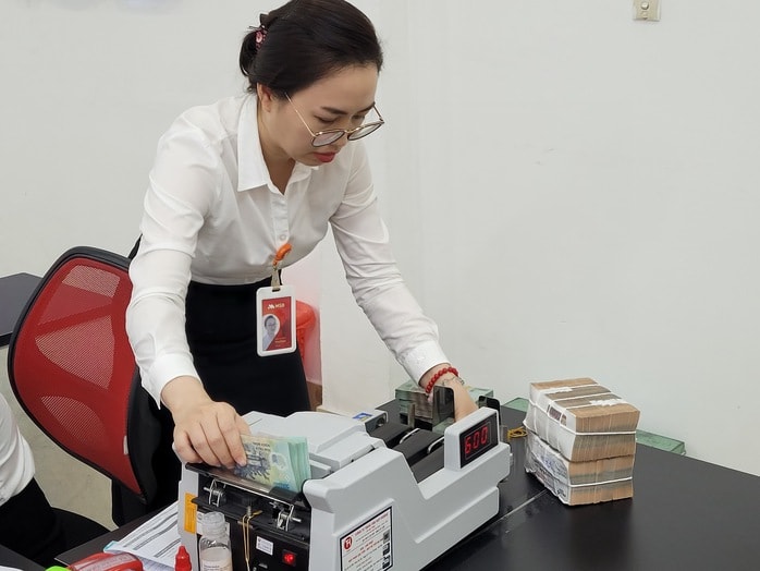 Hàng chục ngân hàng tham gia gói tín dụng 500.000 tỉ đồng- Ảnh 1.