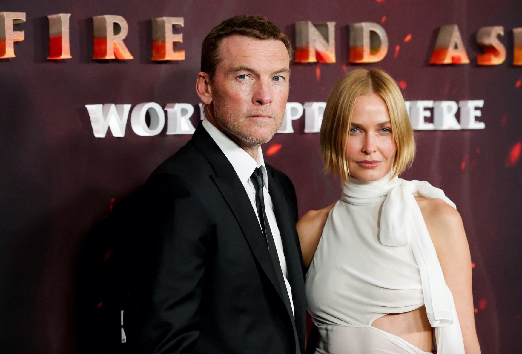 Sam Worthington bên vợ người mẫu.