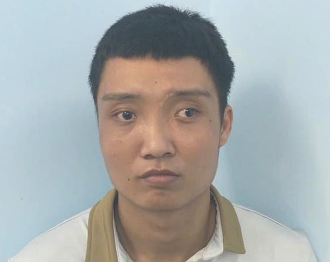 Phạm Ngọc Huy tại cơ quan điều tra. Ảnh: Công an TP HCM