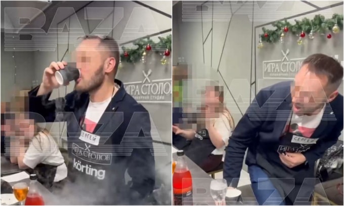 Sergey ôm bụng rồi gục xuống sau khi uống ly cocktail chứa nitơ lỏng. Ảnh: Baza