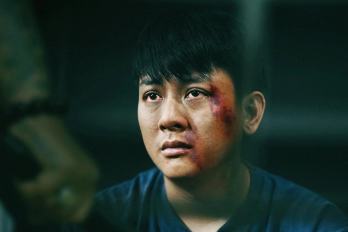 Tạo hình của Hoài Lâm trong phim Thiên đường máu. Phim được phổ biến đến người xem từ đủ 16 tuổi trở lên (16+). Ảnh: Hương Lê