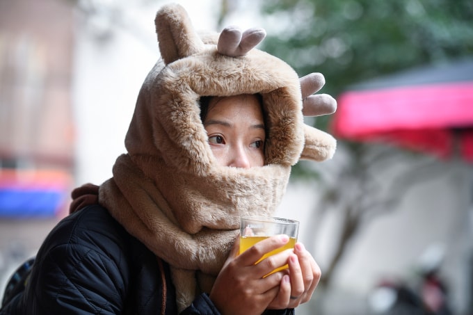 Người Hà Nội trong trời rét. Ảnh: Giang Huy