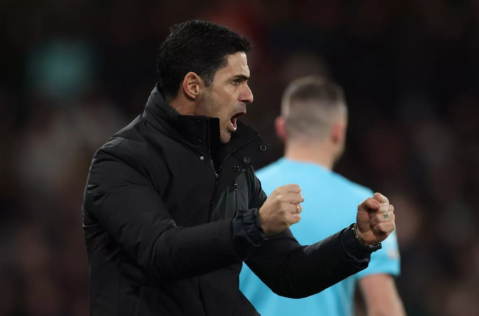 HLV Mikel Arteta ăn mừng trong trận Arsenal thắng Bournemouth 3-2 ở vòng 20 Ngoại hạng Anh trên sân Vitality, Boscombe, ngoại ô Bournemouth, Dorset, Anh ngày 3/1/2026. Ảnh: AMA