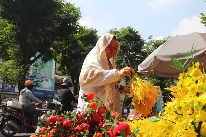 Du khách quốc tế thích thú trải nghiệm không khí Tết ở TP HCM  - Ảnh 3.