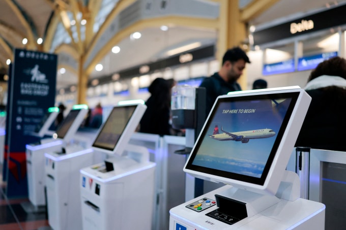 Quầy check in tại sân bay Ronald Reagan Washington ở Arlington, Virginia, ngày 23/12/2025. Ảnh: AFP