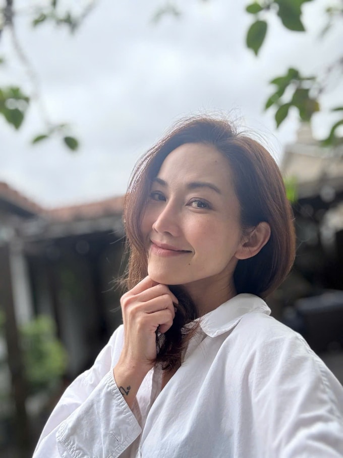 Diễn viên Kim Hiền thấy cuộc sống hiện tại an yên bên hai con. Ảnh: Nhân vật cung cấp