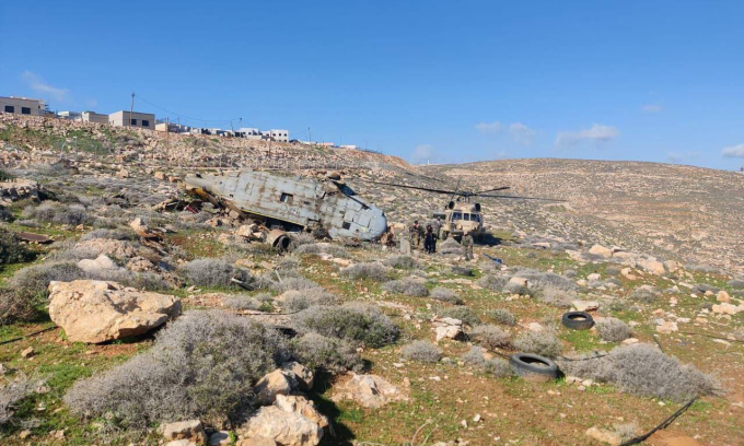 Hiện trường vụ rơi trực thăng UH-60 hôm 16/1. Ảnh: X/Clash Report