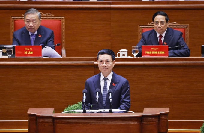 Bộ trưởng Nguyễn Mạnh Hùng trình bày tham luận tại Đại hội sáng 21/1. Ảnh: TTXVN