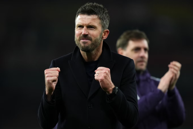 HLV tạm quyền Michael Carrick ăn mừng sau trận Man Utd thắng Arsenal 3-2 ở vòng 23 Ngoại hạng Anh trên sân Emirates, London, Anh ngày 25/1/2026. Ảnh: PA Wire