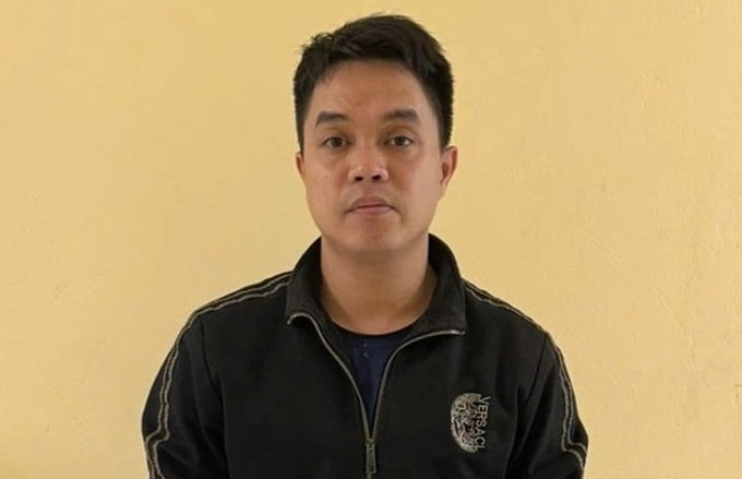 Giám đốc Nguyễn Minh Quang tại cơ quan điều tra. Ảnh: Công an cung cấp