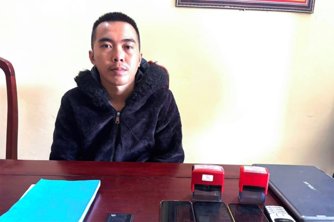 Nghi can Sơn tại cơ quan điều tra. Ảnh: Công an cung cấp